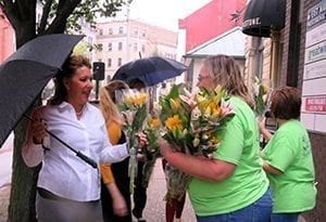 "The rain didn't dampen our goodwill - we gave out 500 bouquets in 45 minutes," posted Neubauer's Flowers & Market House.